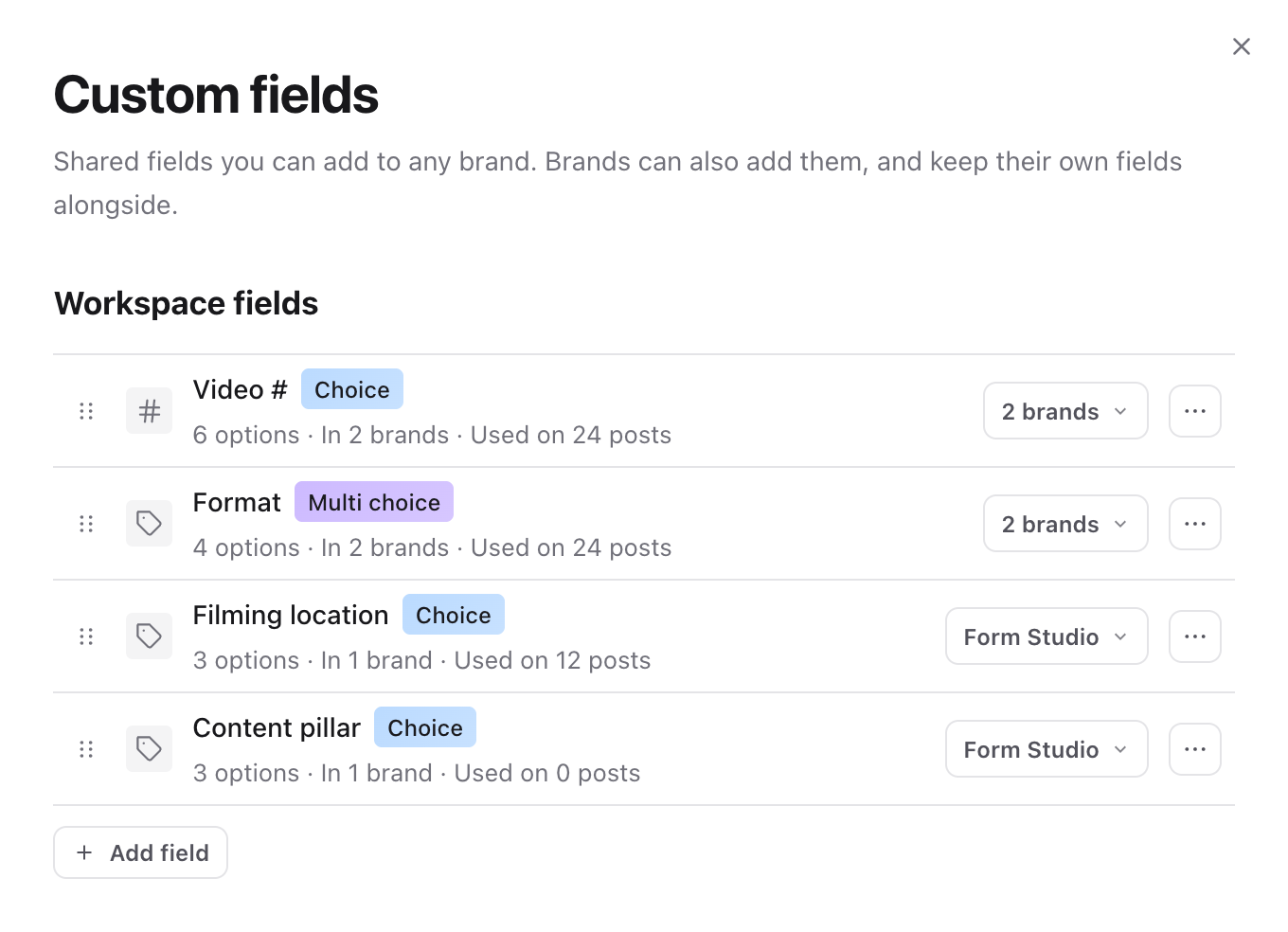 Workspace custom fields settings listing Video #, Format, Filming location and Content pillar with the brands using each field