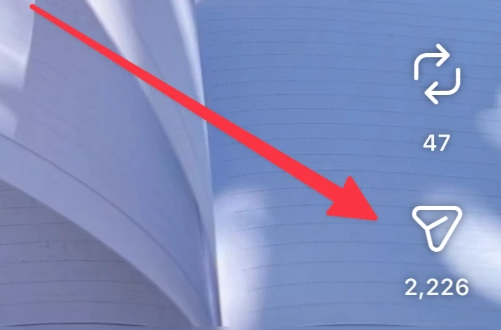 The Share button on an Instagram reel, marked with an arrow
