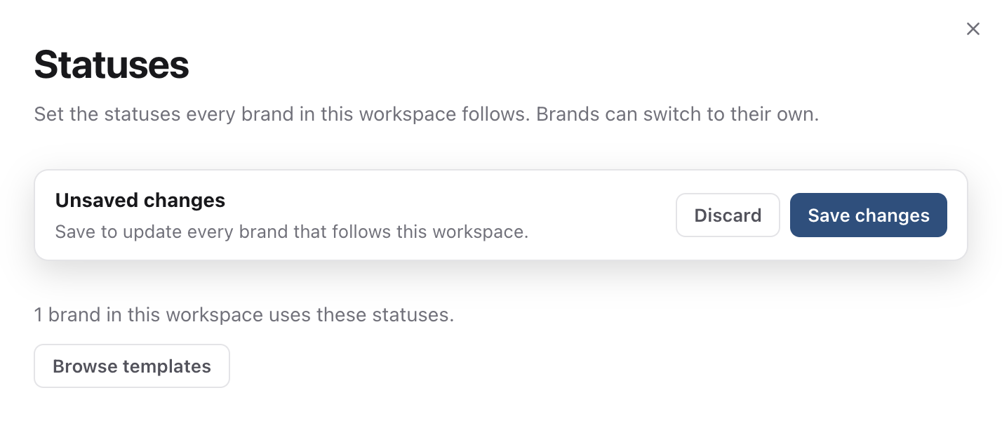 Statuses page with the Unsaved changes bar showing Discard and Save changes